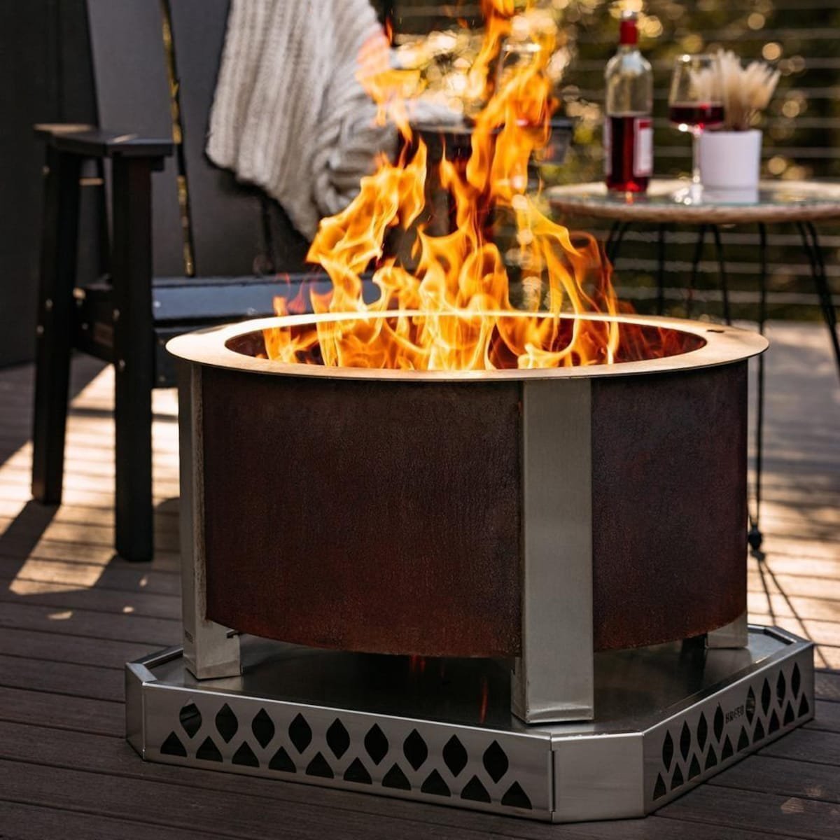 X Series 28 Inch Round Corten Steel Wood-Burning Fire Pit in Stainless Steel by Breeo